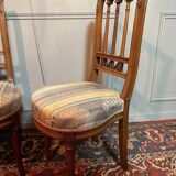 Pair Of Louis XVI Style Chairs In Walnut.