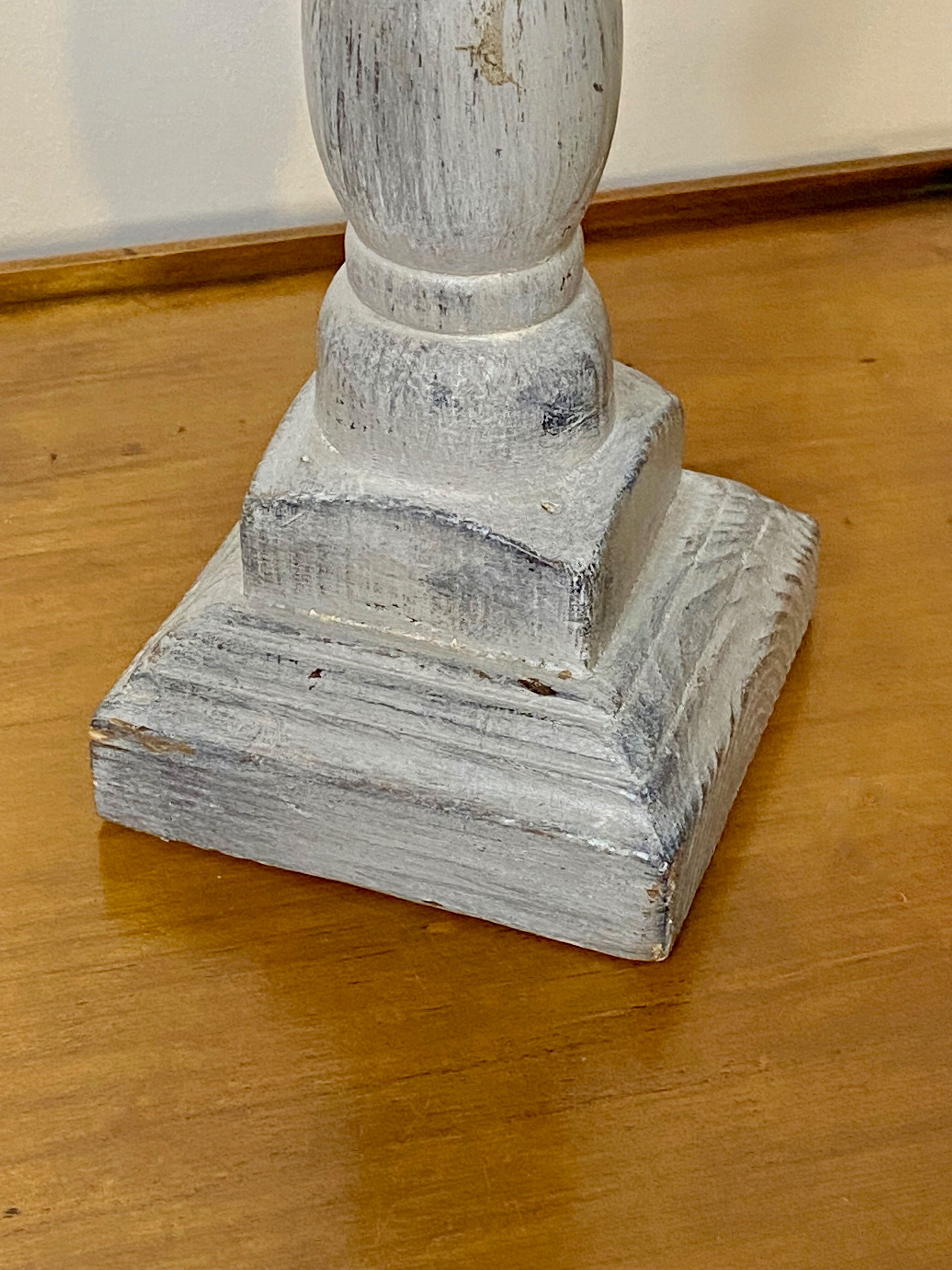 Gray patinated wooden candle holder