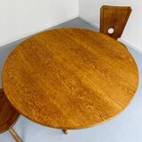 Antique round Scandinavian dining table from the 70s with 1 solid wood extension