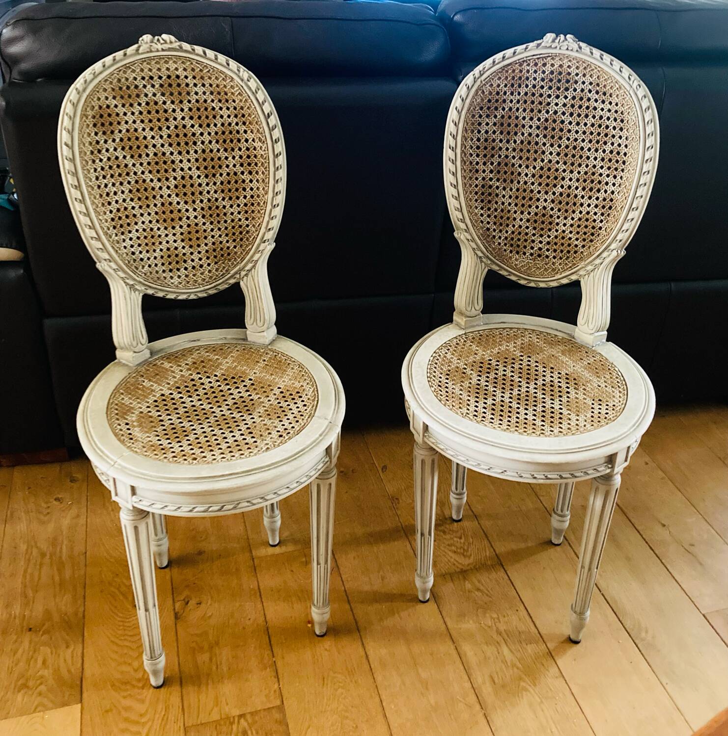 Pair of Louis XVI chairs from the late 19th century with checkerboard caning