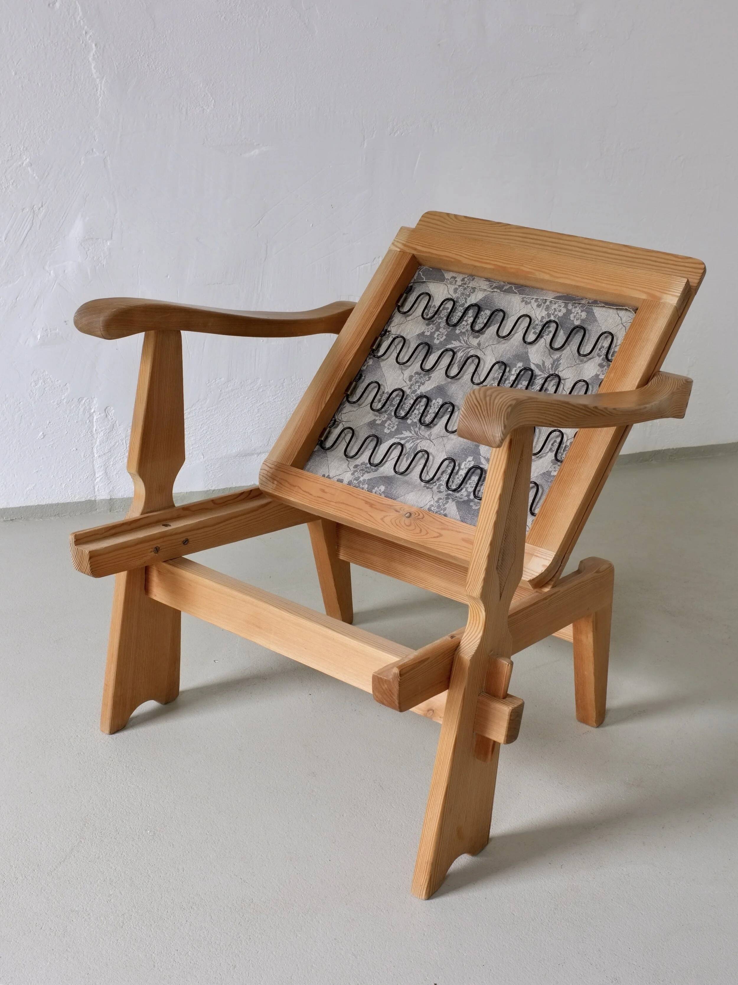 2 carved pine lounge chairs | Scandinavia | 1970s