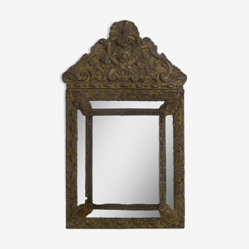 Old mirror with copper beads embossed on wood. Victorian Style