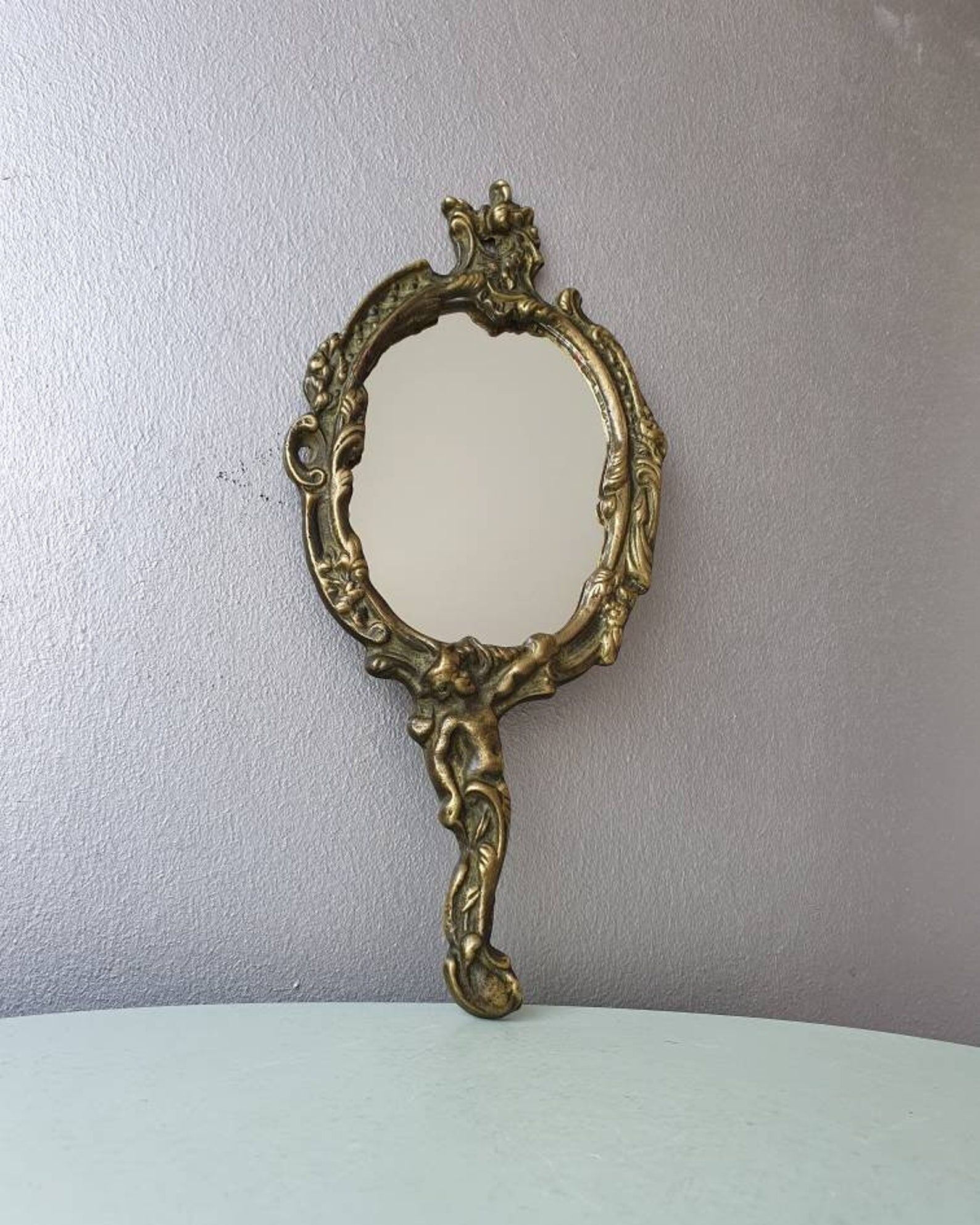 Hand mirror in brass art deco 30 years France