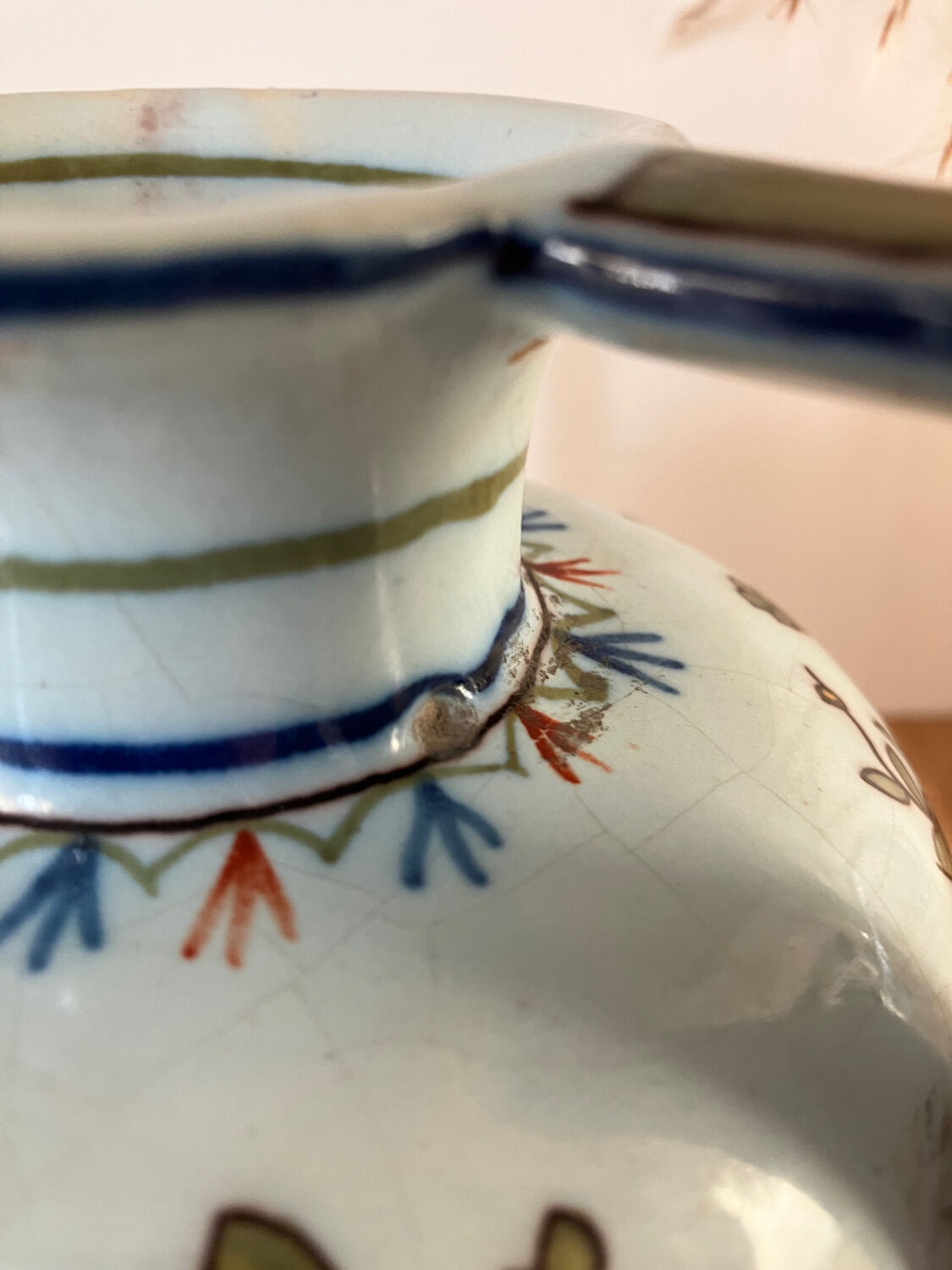 Old vase with floral motif inspired by desvres earthenware