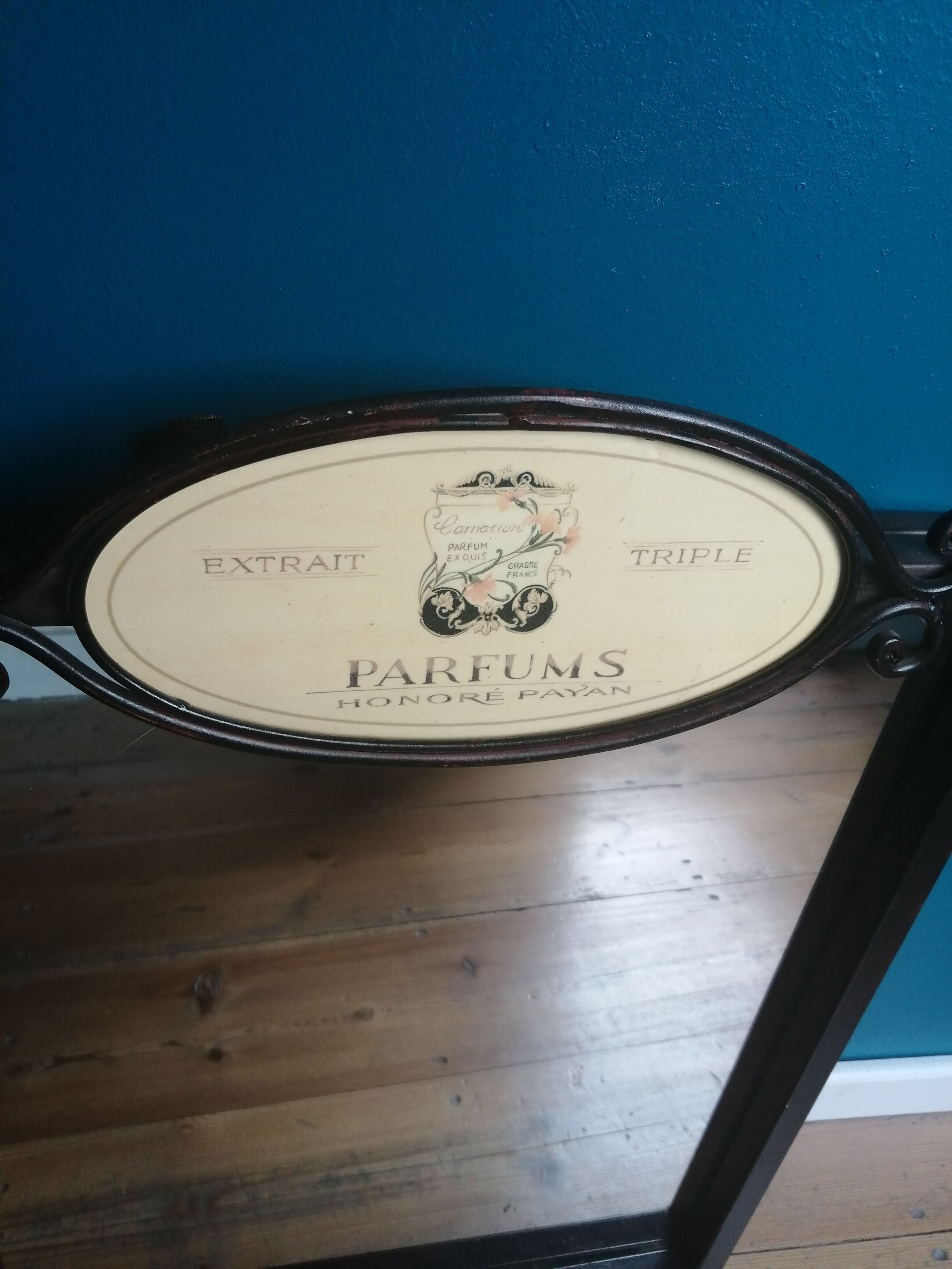 Mirror metal sign perfume