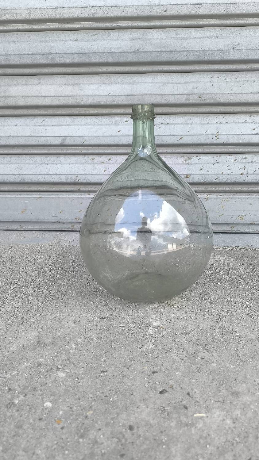 Green demijohn in blown glass