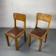 Pair of wooden and leather chairs