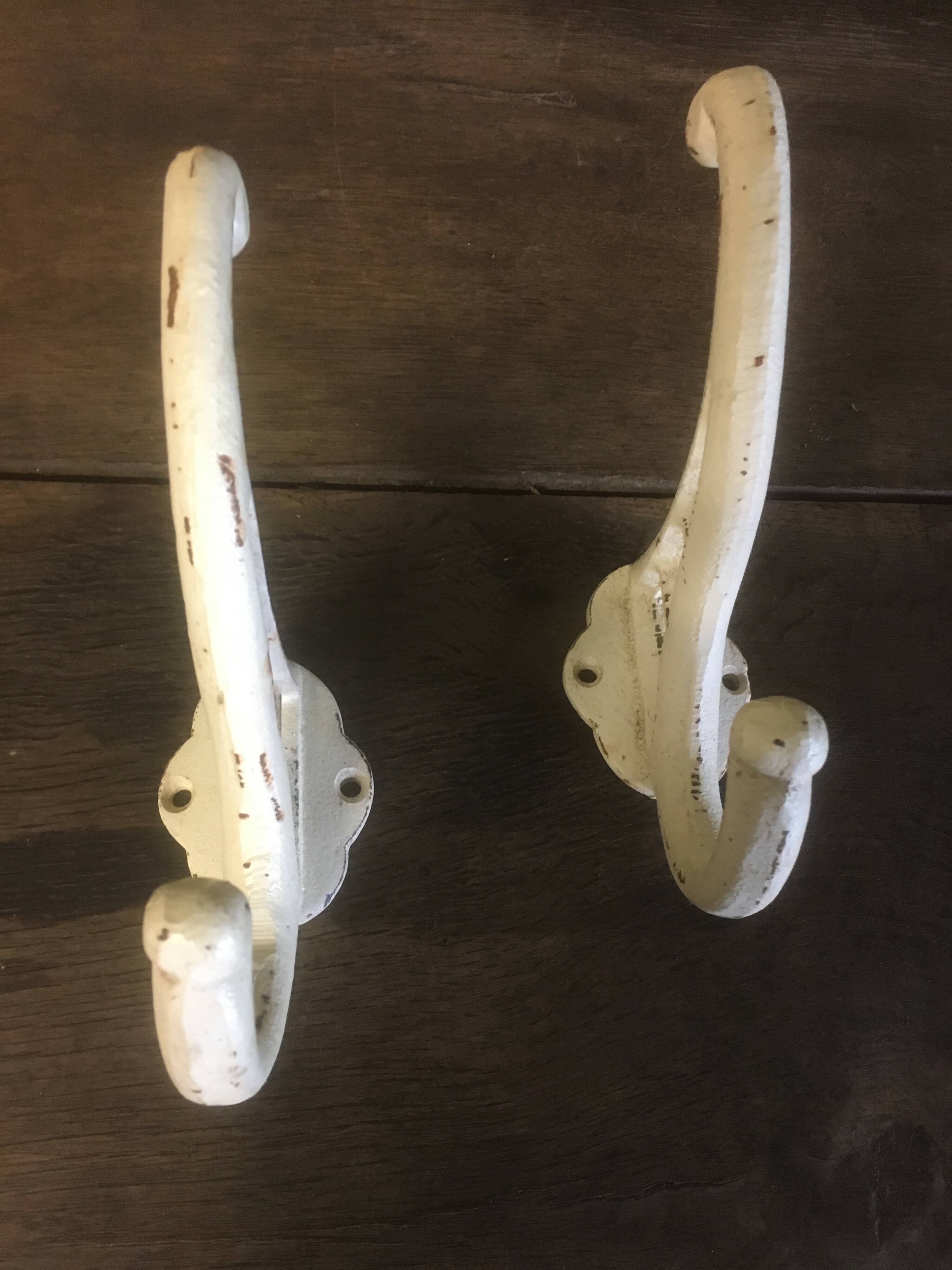 White cast iron wall hooks