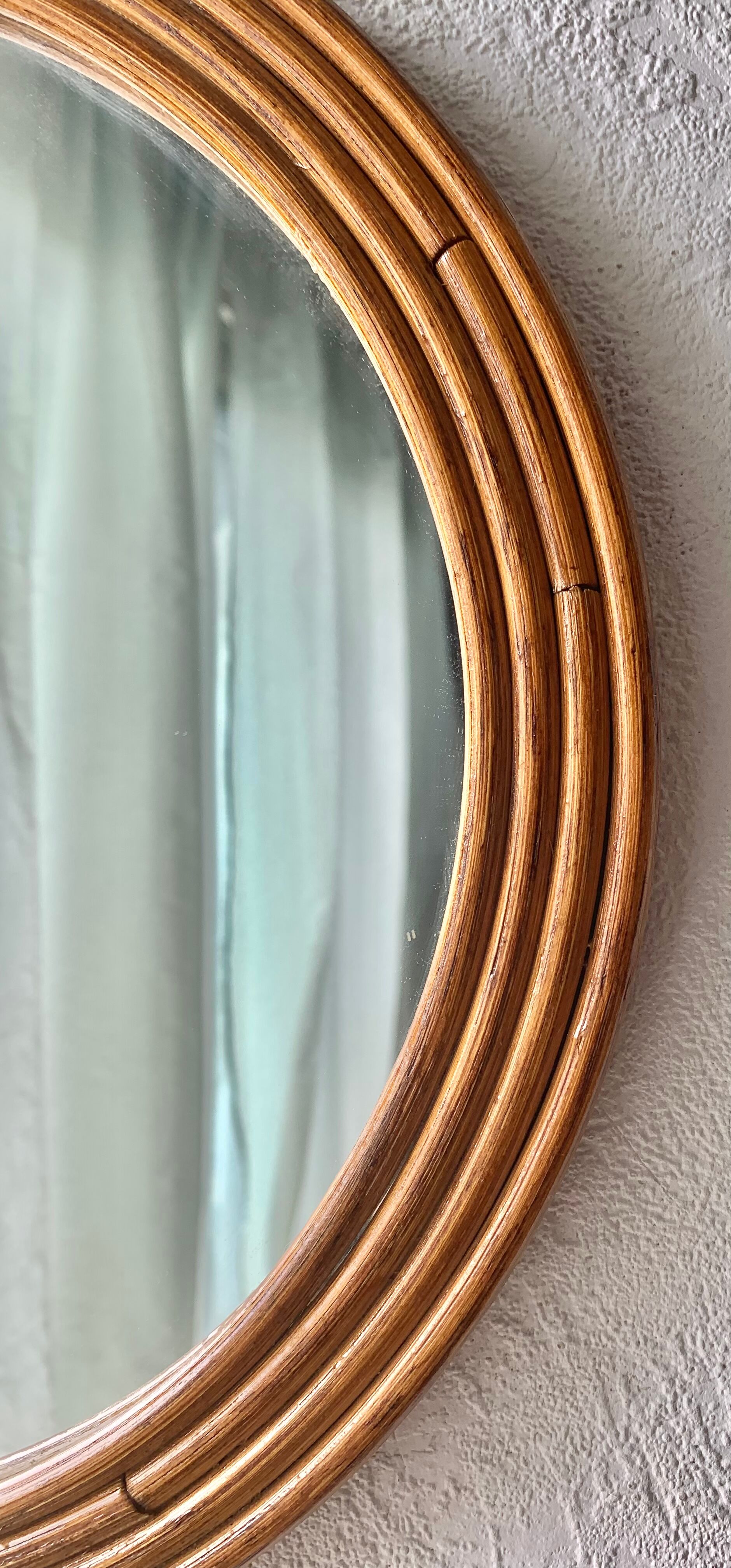 Vintage round rattan mirror