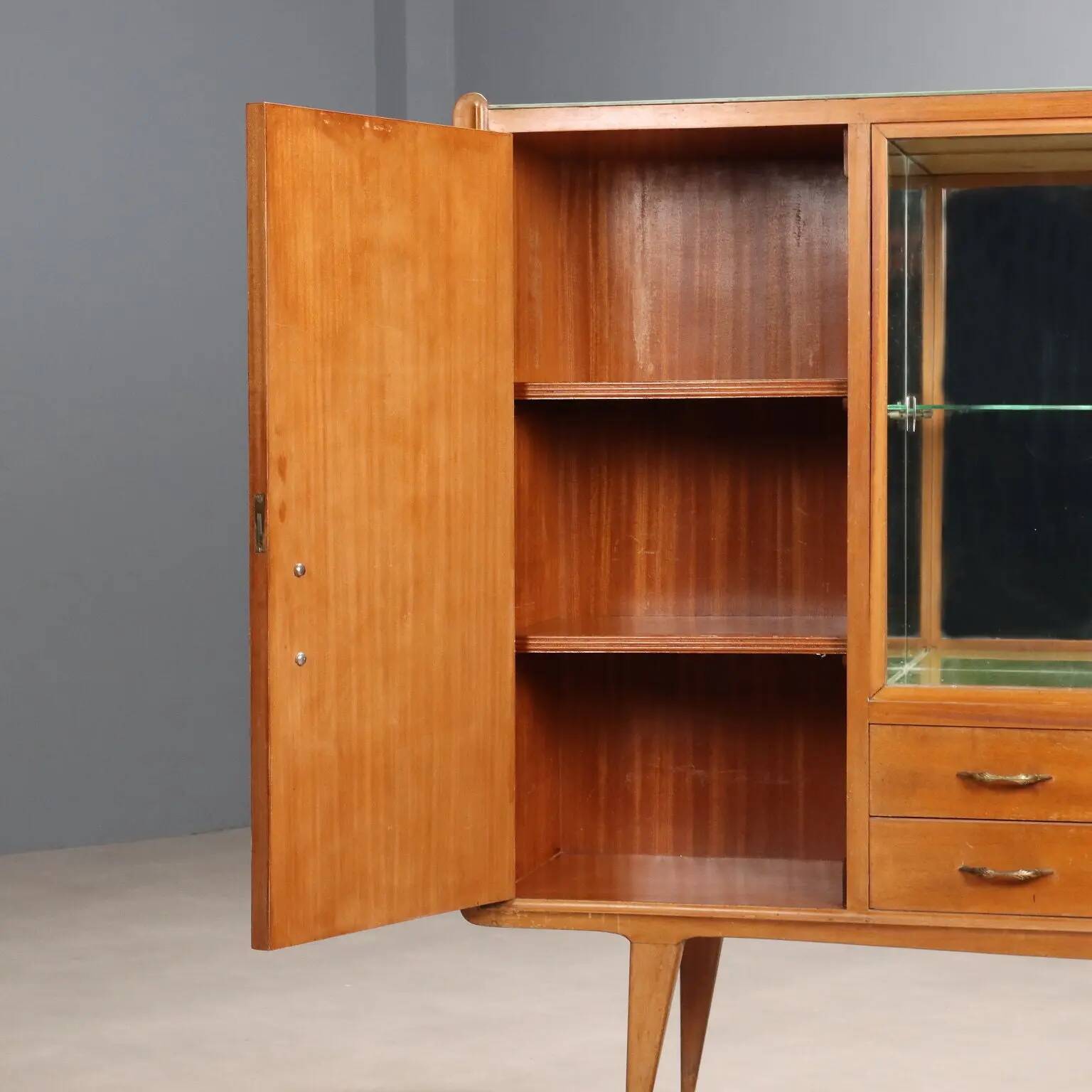 Vintage buffet in walnut veneer, Italian design from the 1960s.