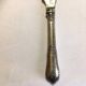 Silver-plated cheese knife with finely chiseled blade, 1900s