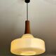 Louis Kalff pendant light in opaline glass and Scandinavian teak