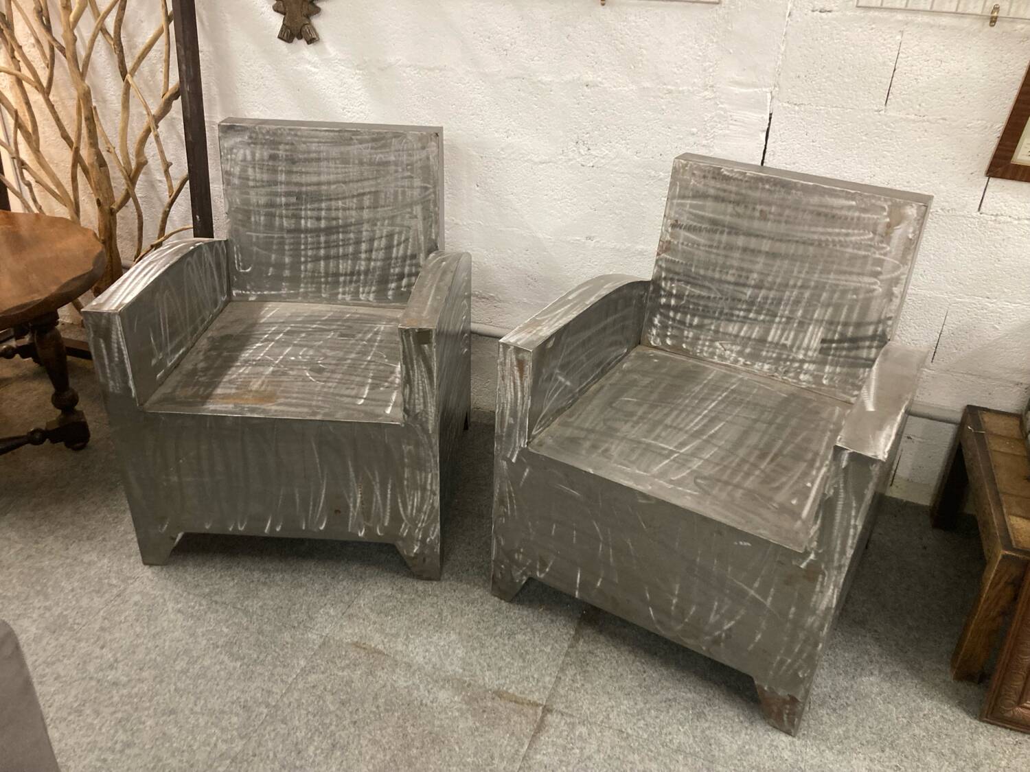 Pair of industrial metal armchairs