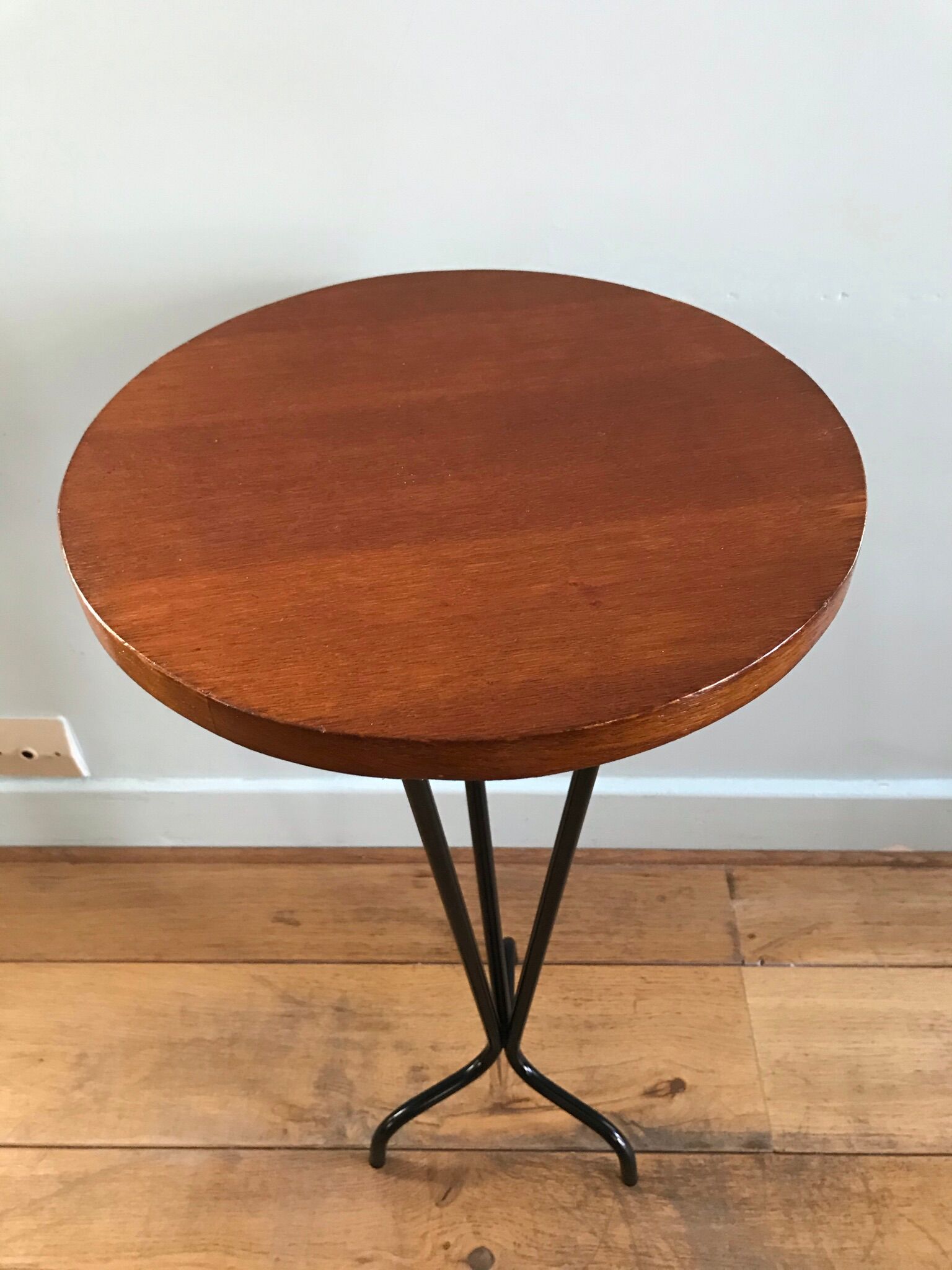 Vintage tripod harness round wooden top on black lacquered metal stand