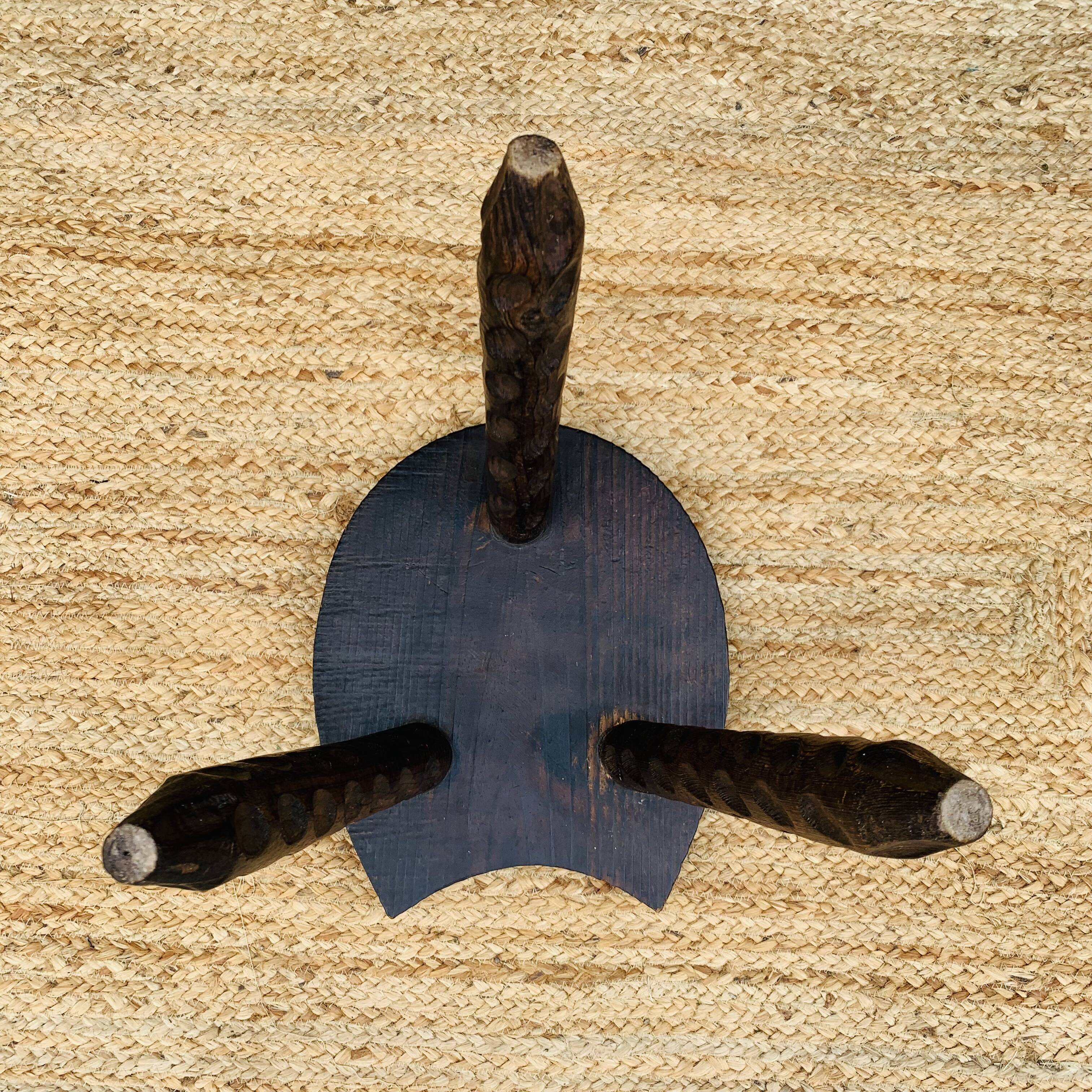 Wooden horseshoe stool