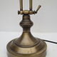 Old aged brass articulated desk lamp