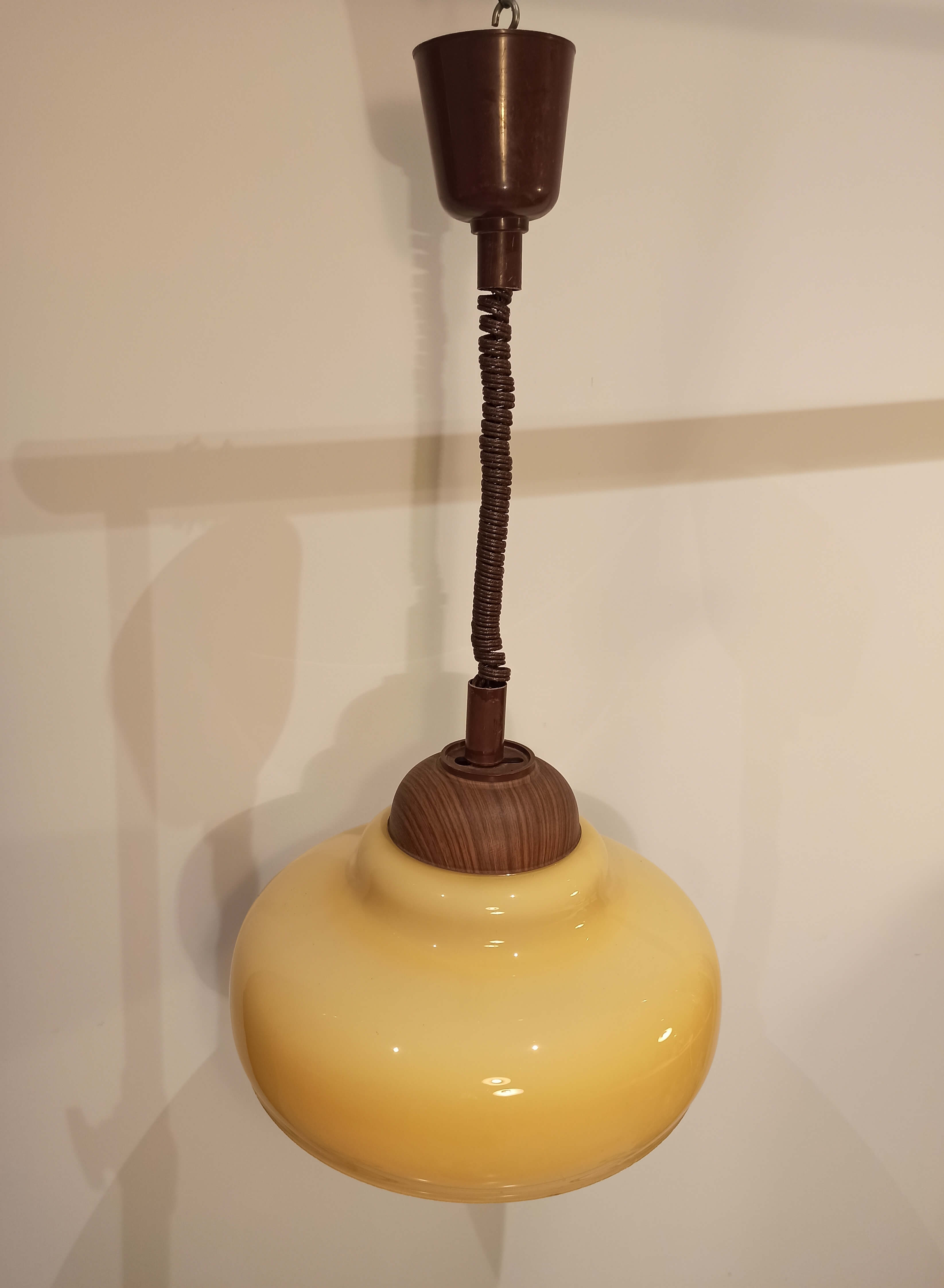 Vintage pendant light in mustard yellow glass 1960s goes up and down