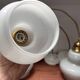 Lot de trois suspensions scandinaves en opaline blanche