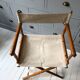 Former director's side chair in wood and canvas