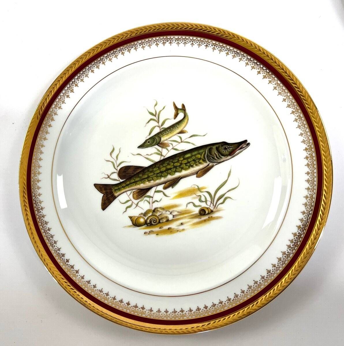Porcelain plates and fish decoration sauce boat from Limoges, 1980s, set of 13.