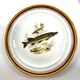 Porcelain plates and fish decoration sauce boat from Limoges, 1980s, set of 13.