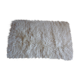 Tapis à longs poils et en pure laine - 105x70cm