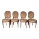 Suite de 4 chaises style Louis XVI médaillon