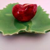 snail fork holder in snail slurry on tree leaf
