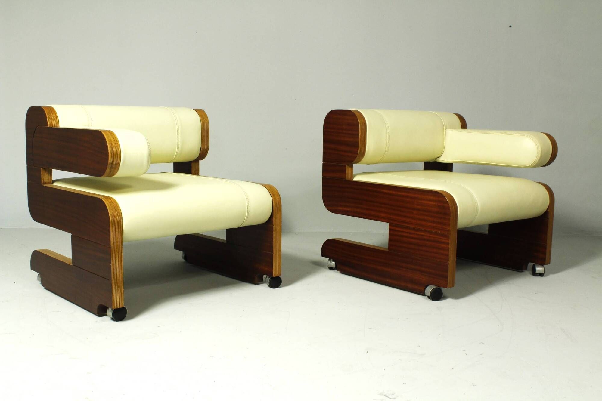 Pair of Mahogany Club Chairs upholstered in leather, 1970s