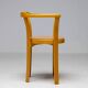 Stackable chairs in curved beech.