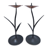 Pair of flower-shaped candlesticks in black metal and copper