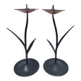 Pair of flower-shaped candlesticks in black metal and copper