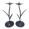 Pair of flower-shaped candlesticks in black metal and copper