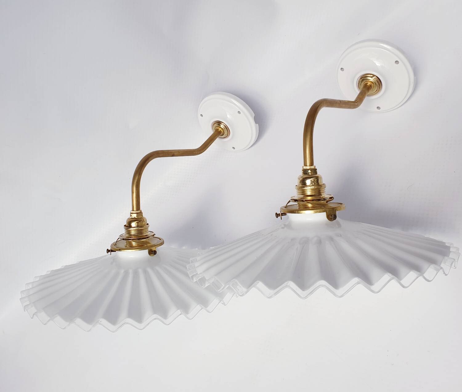 vintage wall lights in brass and pleated opal glass