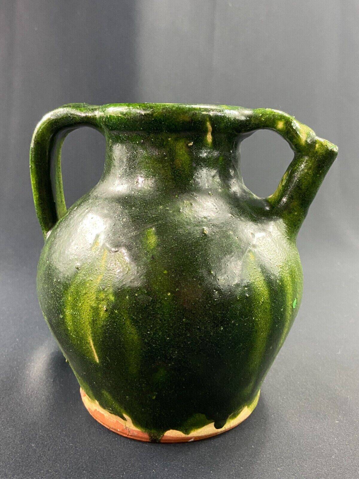 19th century green enamelled stoneware jug