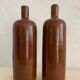 Duo of vintage bottles enamelled sandstone