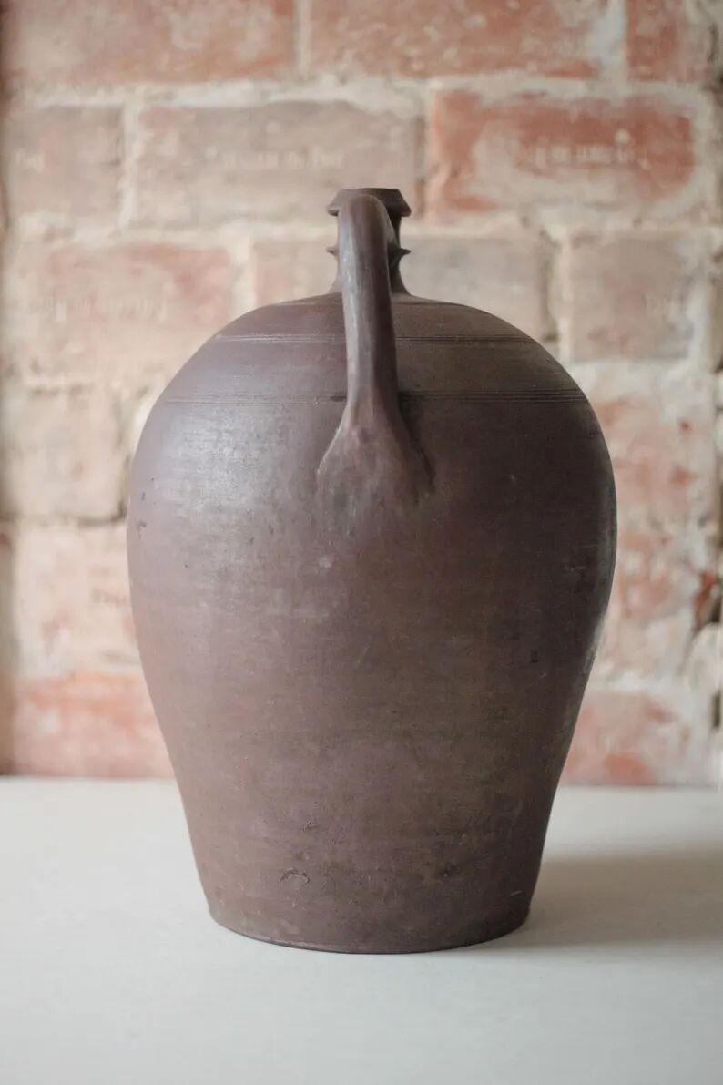 Old handled pot, antique pot, handled jar, interior decoration, collection, pottery.