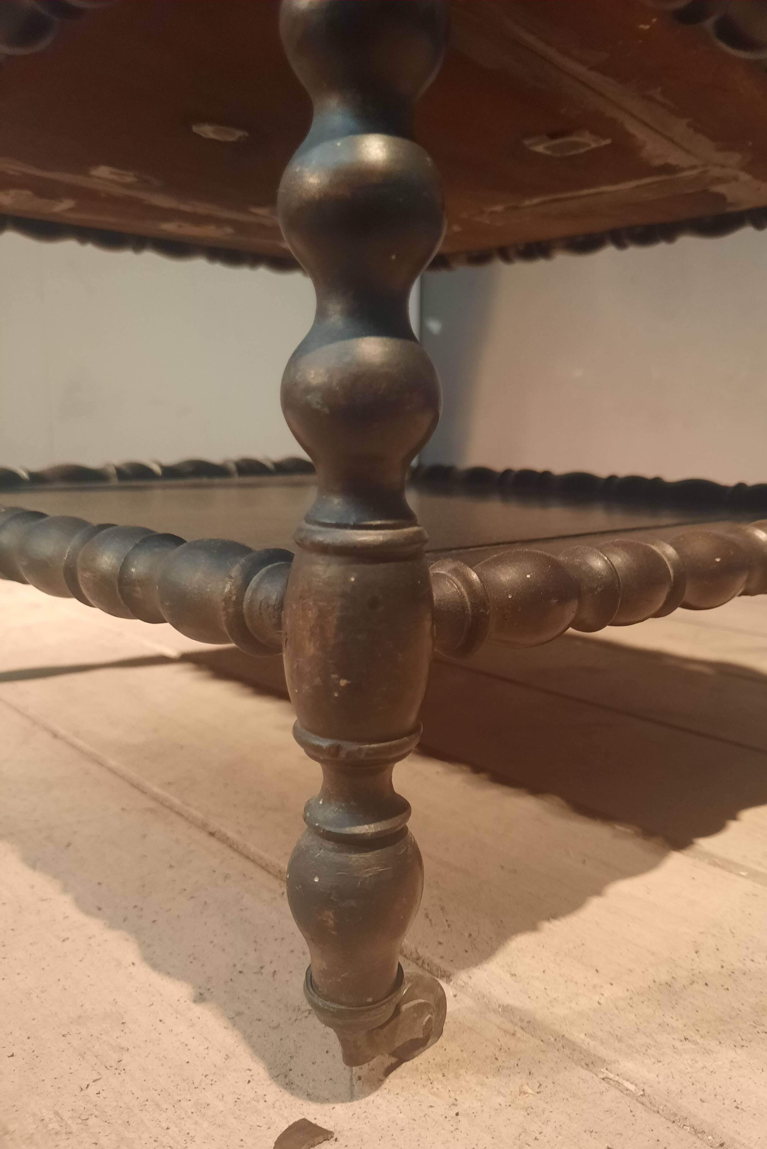 Rosewood magazine rack on casters