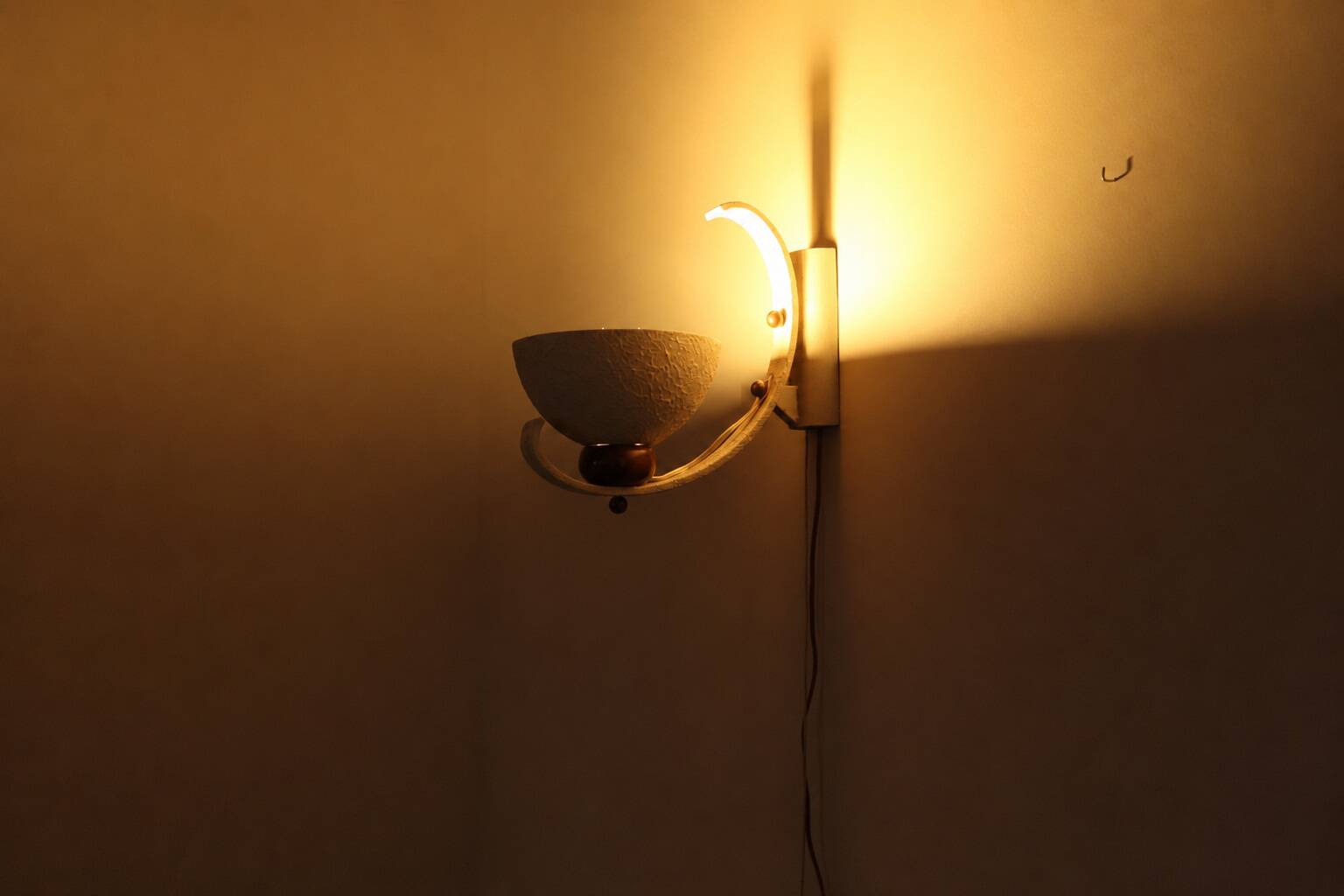 Pair of sculptural mid-century wall uplighters, circa 1950