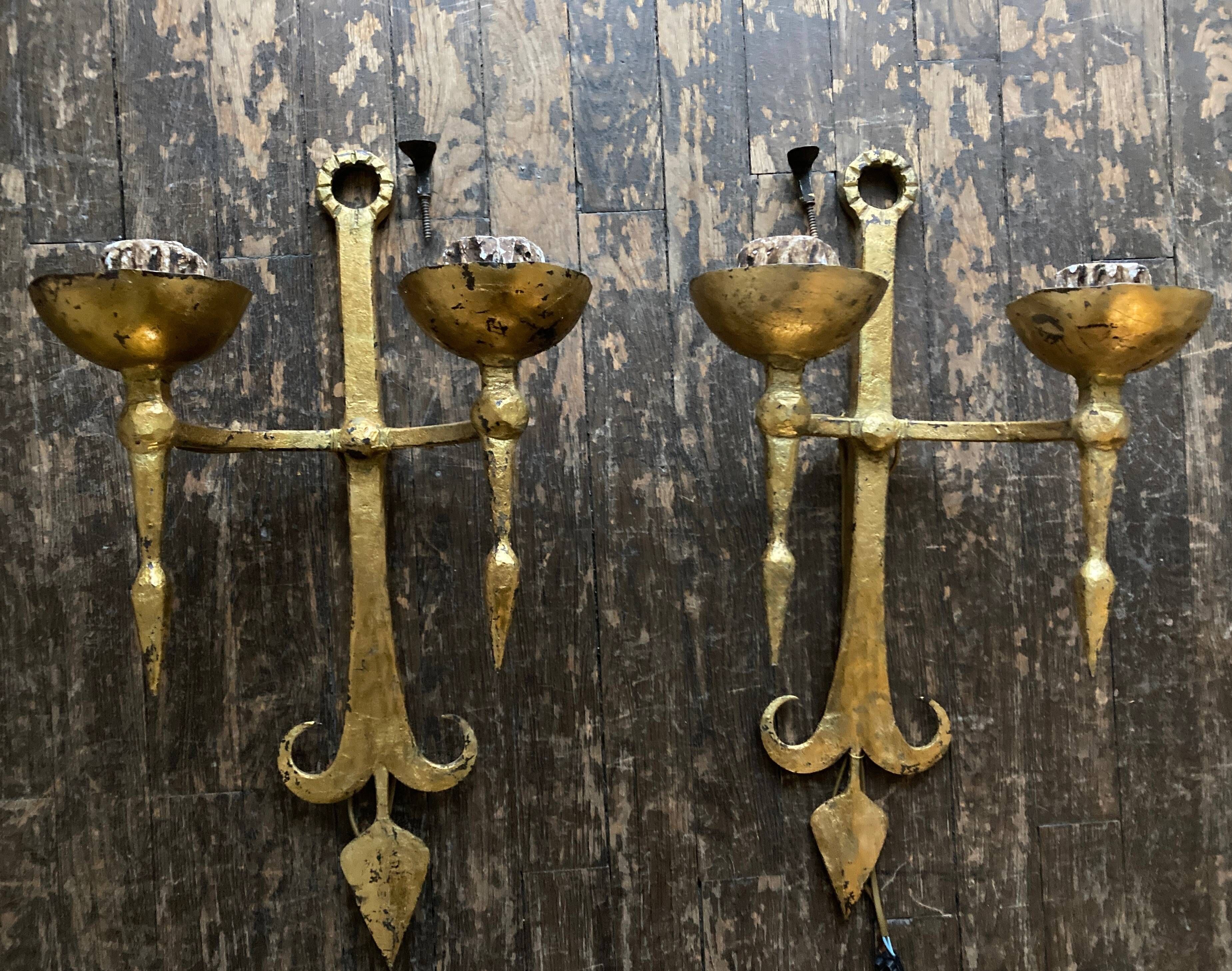 Pair of XXL torchlight sconces in golden beaten iron Italian work 1960