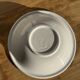 Small earthenware bowl from Italy, white with brown, green, and orange trim, D24.5.