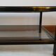 Table basse noire ,or et double plateau verre fumé