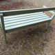 Veranda garden bench in patinated almond green solid wood
