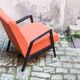 Fauteuil orange et noir scandinave restauré