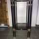 Metal square sellette and 2-storey smoked glass