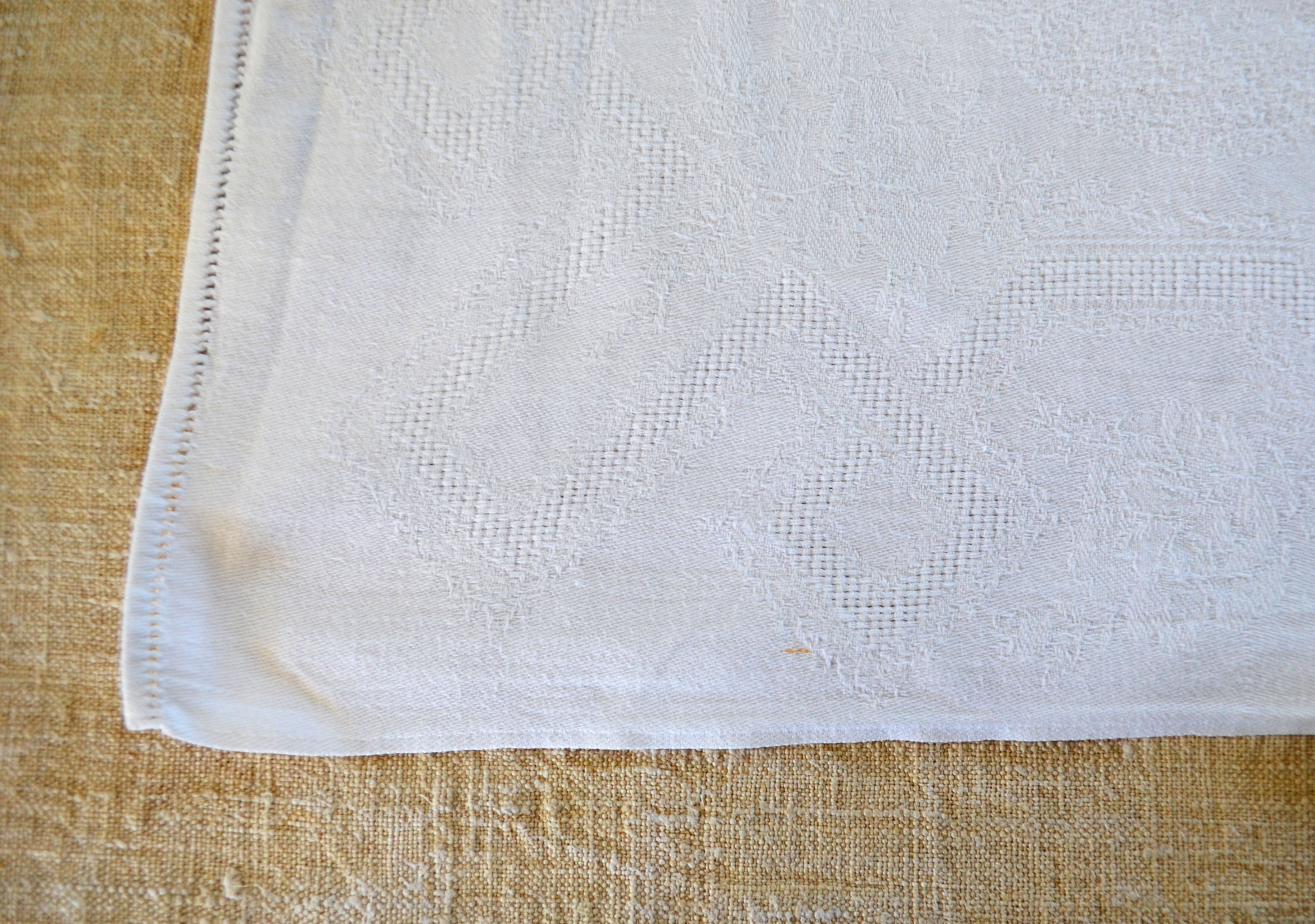 Set of 12 hand-embroidered cotton damask napkins