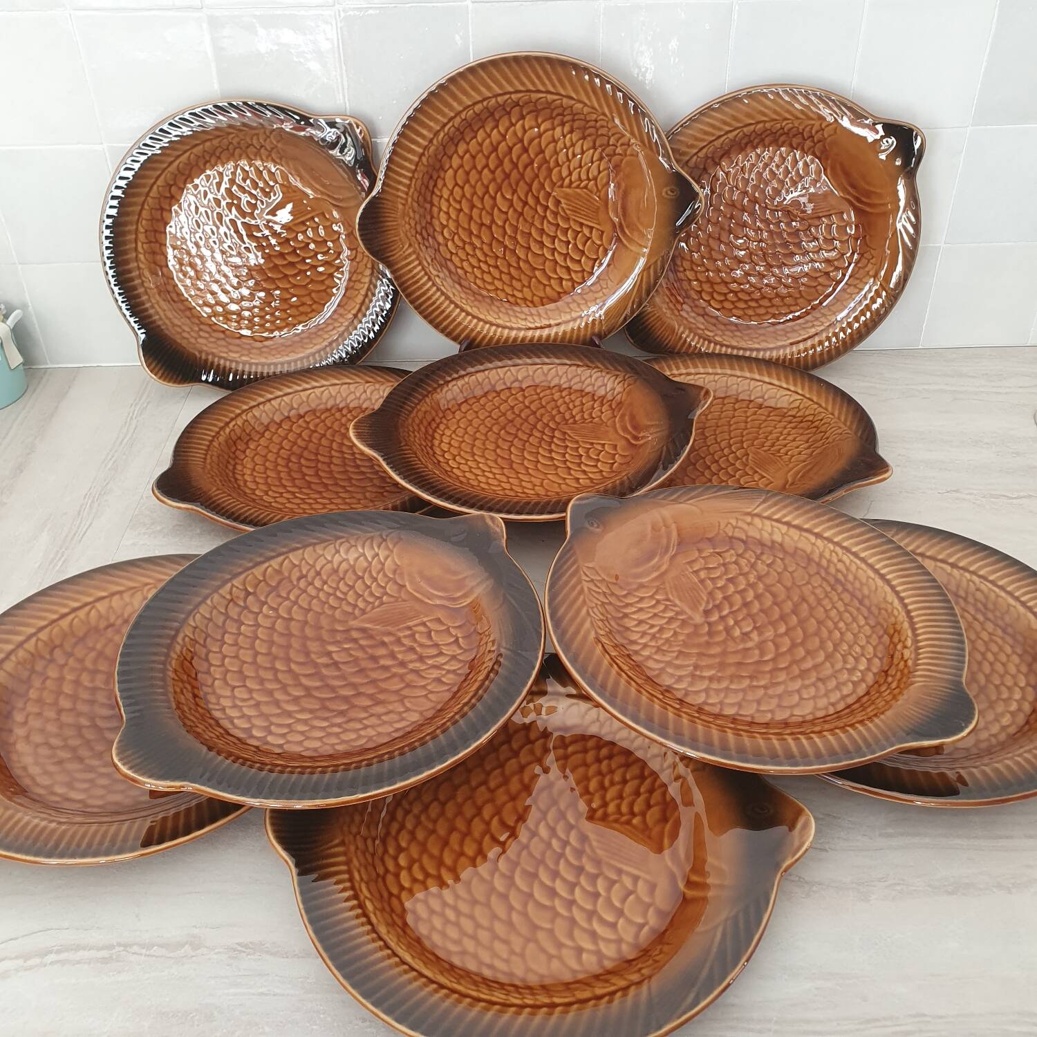 Sarreguemines / 11 earthenware fish-shaped plates