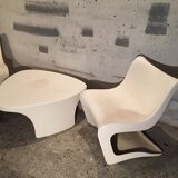 Two armchairs and a coffee table