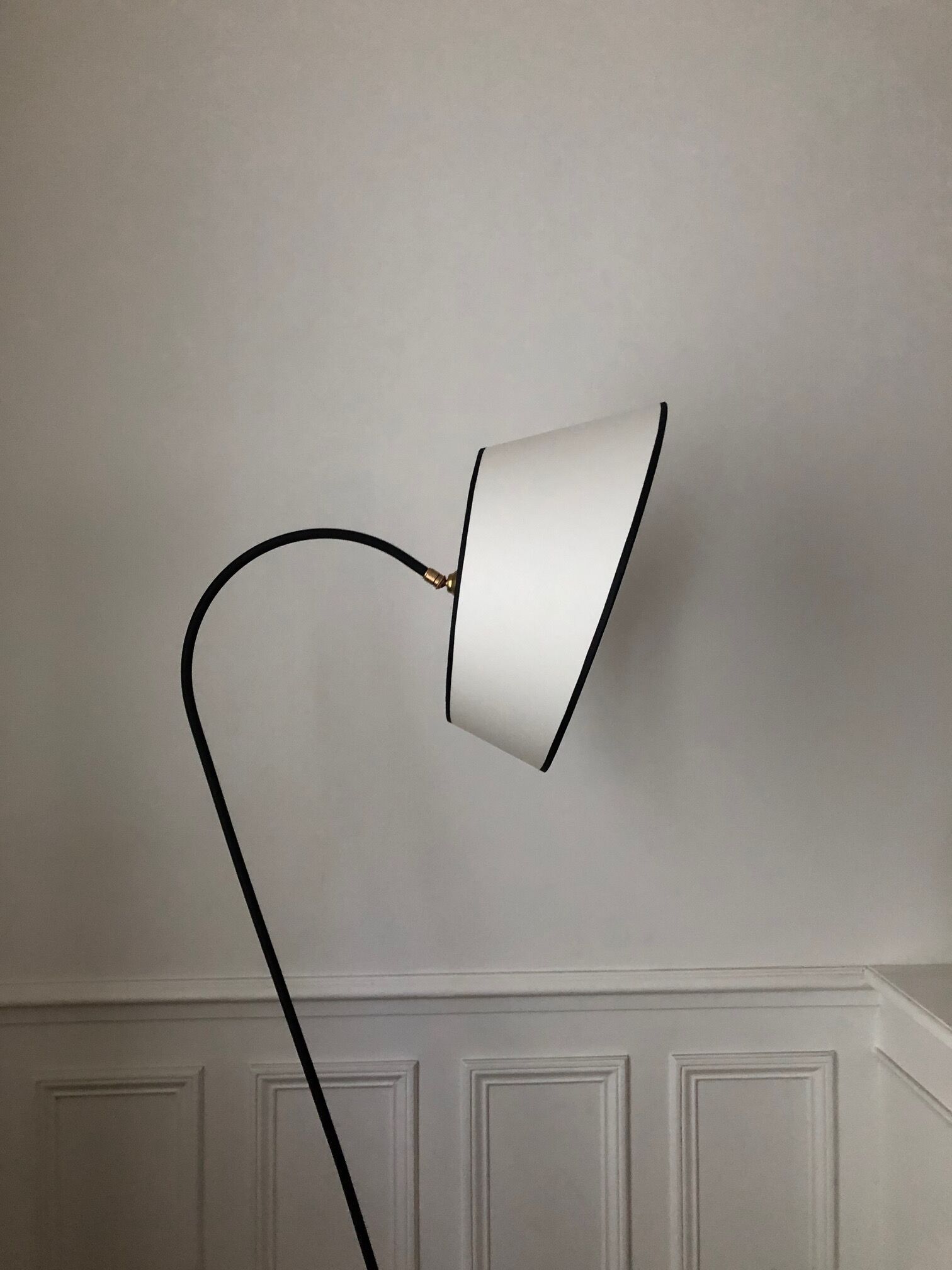 Tripod floor lamp and magazine door 1950