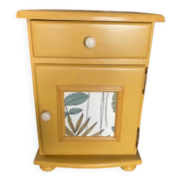 Vintage bedside table revamped - ochre yellow and botanical pattern